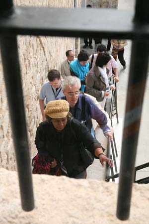 Visitors walk up the stairs at the prison