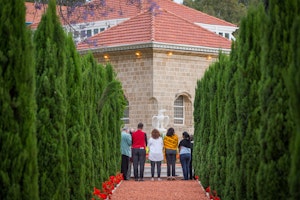Prayers are offered outside the Shrine
