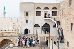 Delegates visit the prison in Akka