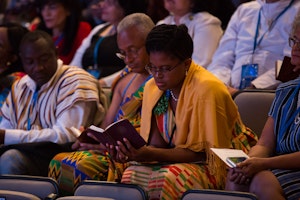 Delegates from Ghana pray