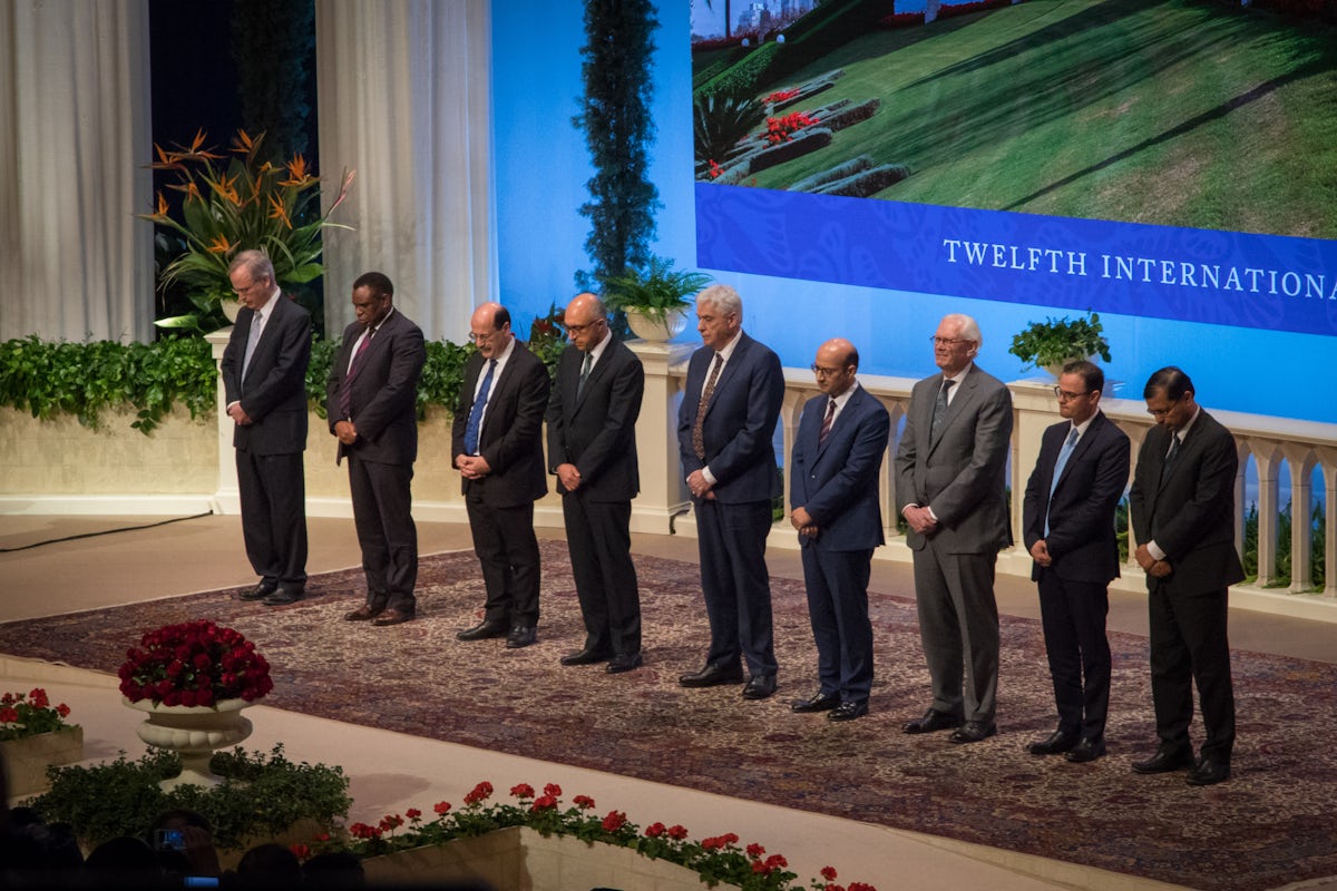 The members of the Universal House of Justice are, from left to right, Paul Lample, Chuungu Malitonga, Payman Mohajer, Shahriar Razavi, Stephen Hall, Ayman Rouhani, Stephen Birkland, Juan Mora, and Praveen Mallik. The House of Justice was elected by delegates to the 12th International Baha’i Convention in Haifa.