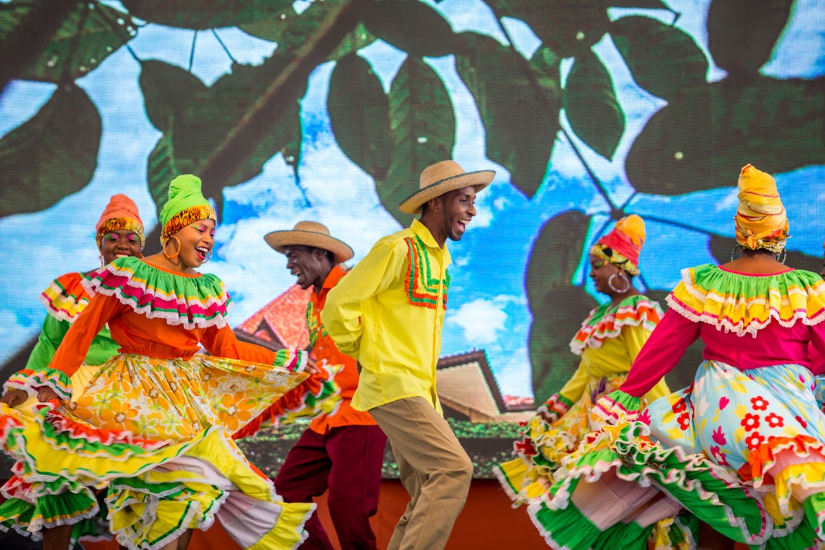 A dance group performs to the song âAlma Nortecaucana,â meaning âthe Soul of Norte del Cauca,â which is about the arrival of the Bahaâi Faith in the region and how Bahaâuâllahâs teachings are given expression in the hopes and aspirations of the people